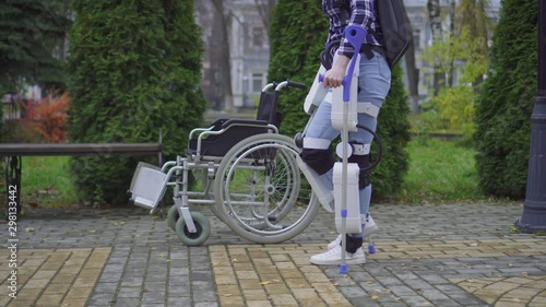 paralyzed man learns to walk again with robotic exoskeleton photo