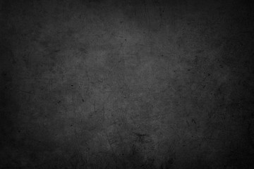 Dark grunge textured concrete background