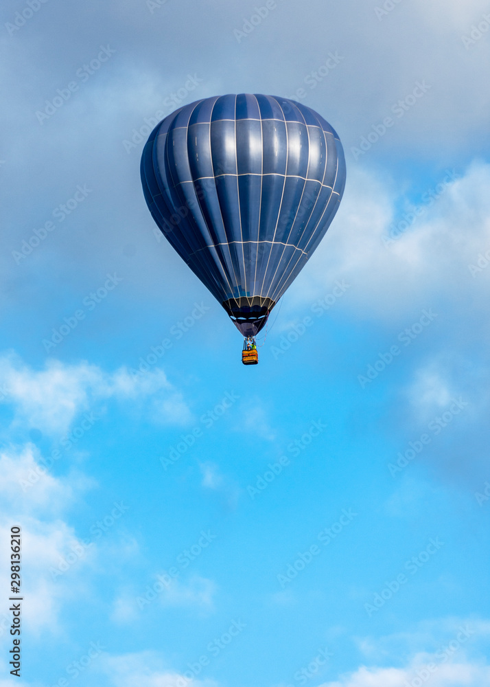Fototapeta premium Blue hot air balloon in tourist flight