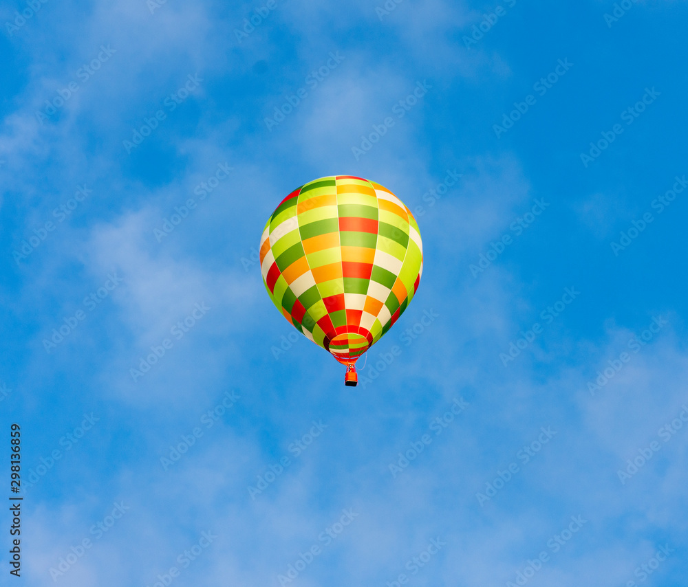 Colored hot air balloon in tourist flight Colored hot air balloon in tourist flight