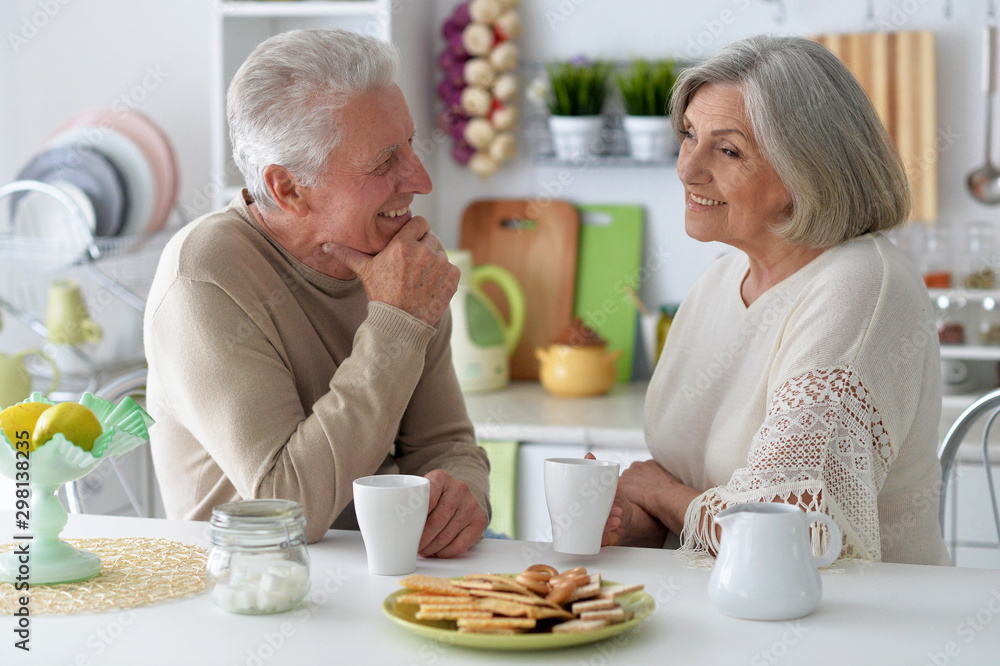 Portrait of cute mature couple drinking tea Portrait of cute mature couple drinking tea