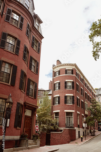 Beautiful brick residential buildings on a Fall day, in the historic Beacon Hill neighborhood of Boston, Massachusetts. © Jen Lobo