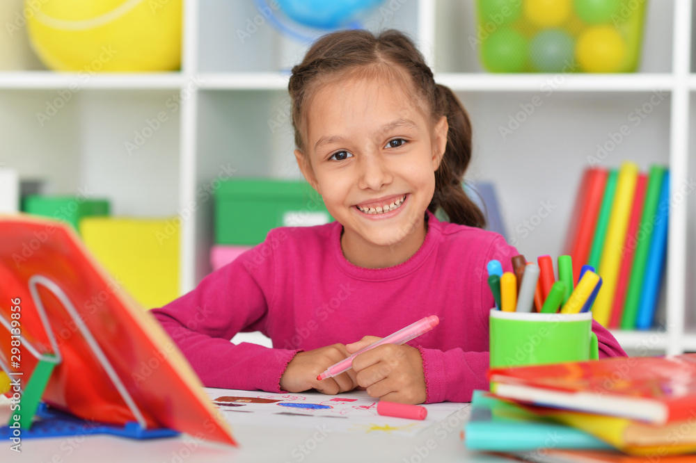 Close up portrait of cute smiling girl drawing Close up portrait of cute smiling girl drawing