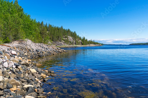 The shore of the White Sea on a sunny summer day. © Sergey Rybin