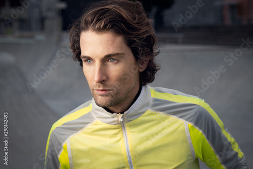 Portrait of attractive man in stylish active wear