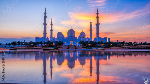 Sheikh Zayed Grand Mosque and Reflection in Fountain at Sunset - Abu Dhabi  United Arab Emirates  UAE 
