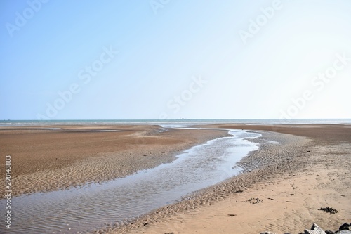 beach with sand and waves