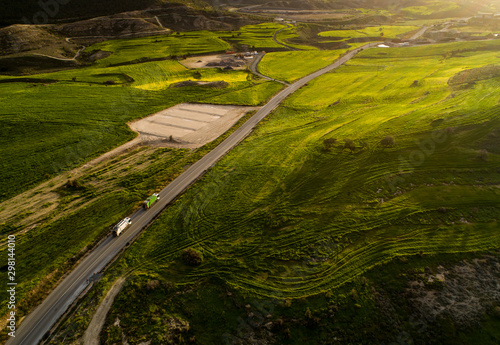 trucks on a road photo