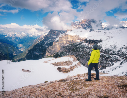 Young man in yellow jacket ...