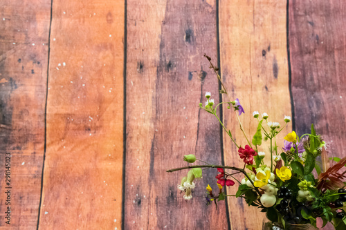 Wild flowers on an old wooden background, autumn, nature, flowers