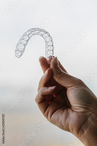 Close-up of some hands holding a splint working in profesional dental lab