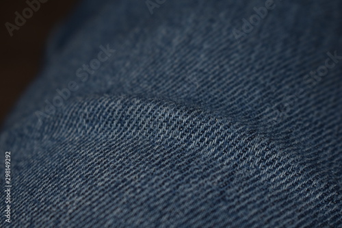 Closeup view of denim jeans, copy space.