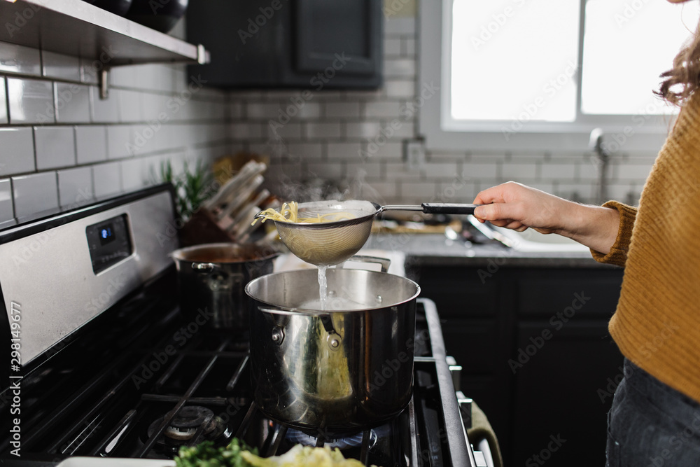 Woman Cooking Noodles Woman Cooking Noodles