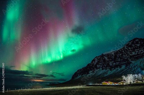 Colorful northern lights in Iceland on the beach 