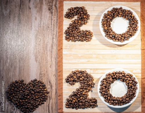 coffee beans on wooden background 2020