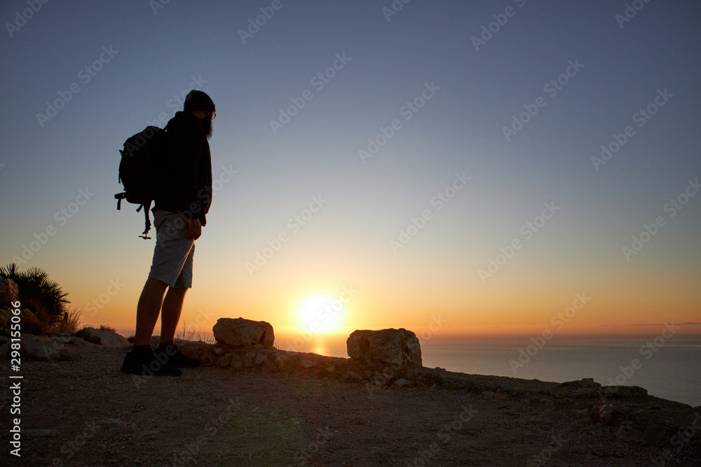 traveler man at sunrise adventure concept traveler man at sunrise adventure concept