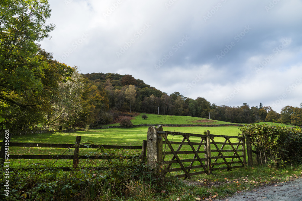 A double wooden gateway seen beside Lake Windermere in Cumbria during the autumn of 2019.