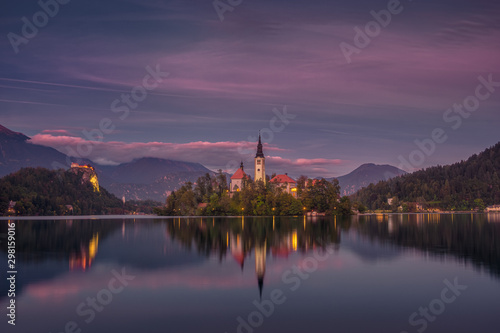 Colorful sunset landscape view of Lake Bled island and church, Slovenia