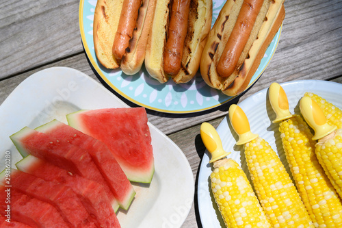 Watermelon, hot dogs and corn cobs