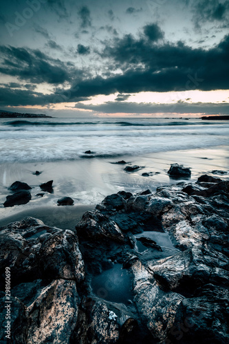 Wallpaper Mural Rocks on beach at sunset in Tenerife, Spain Torontodigital.ca