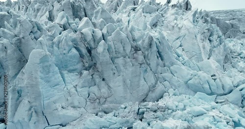 Aerial view of Folgefonna glacier top surface. Melting ice cap. Blue ice. Glacial pikes. Norway. photo