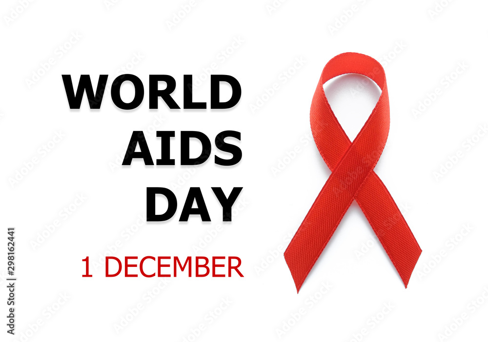 World AIDS day concept. Red ribbon or awareness ribbon as symbol for the solidarity of people living with HIV or AIDS. World AIDS day concept. Red ribbon or awareness ribbon as symbol for the solidarity of people living with HIV or AIDS.
