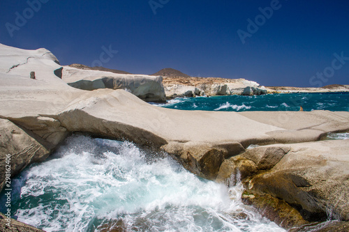 Waves crashing into rocks