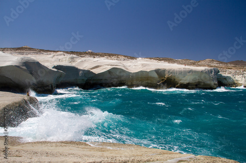 waves crashing on rocks