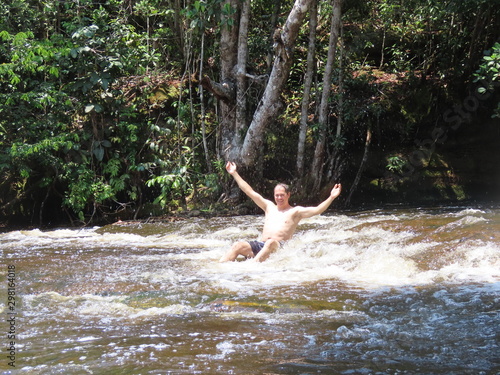 Man in waterfall