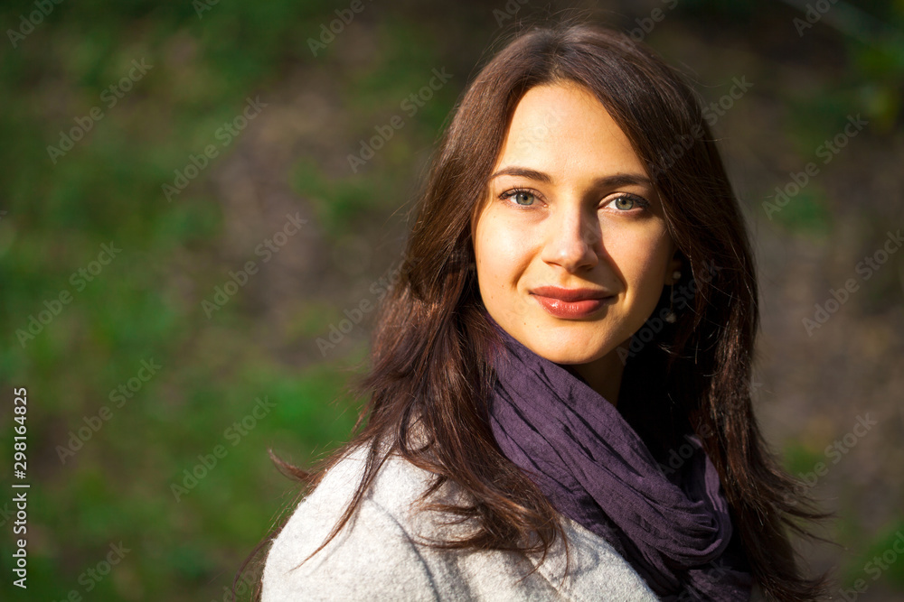 Portrait of a young beautiful woman in gray coat Portrait of a young beautiful woman in gray coat