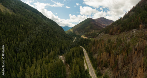 Aerial Panoramic View of a Scenic Highway in the Valley surrounded by Canadian Mountain Landscape. Taken near Creston, British Columbia, Canada. photo