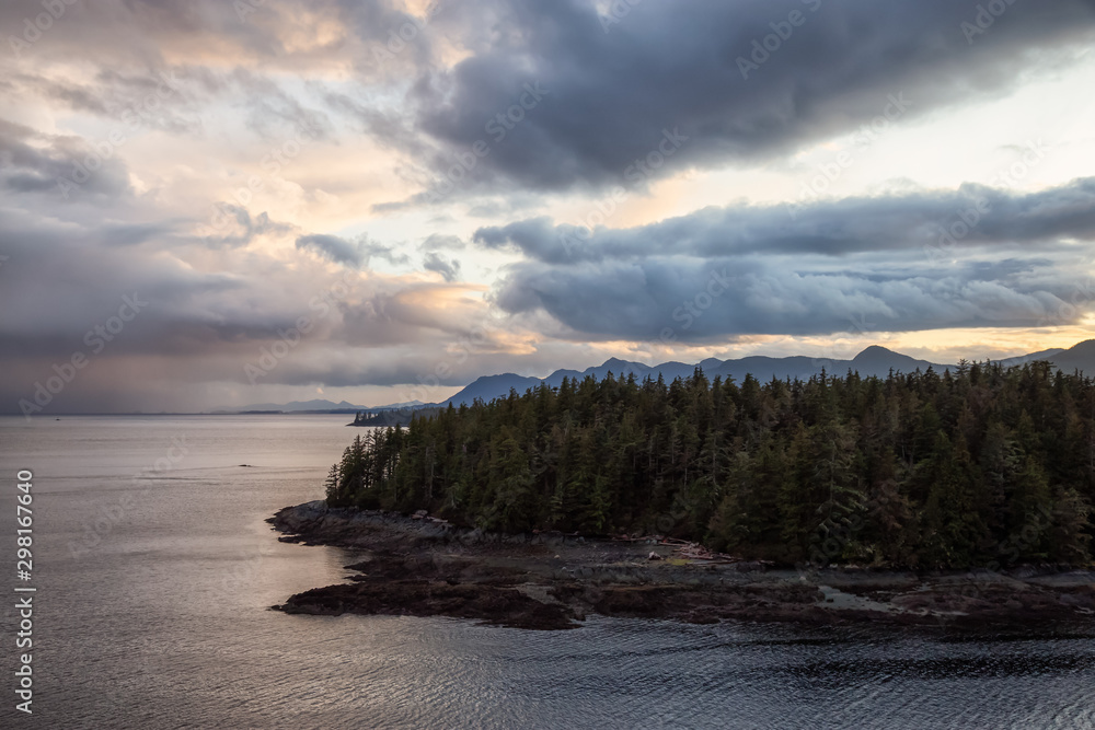 Beautiful View of American Landscape on the Ocean Coast during a dramatic stormy sunset. Taken near Ketchikan, Alaska, United States.