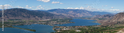 Aerial Panoramic View of a Small Touristic Town during a beautiful sunny summer day. Taken in Osoyoos, British Columbia, Canada.