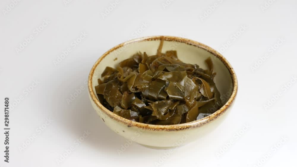 Kelp salad in a ceramic bowl. Kelp salad in a ceramic bowl.
