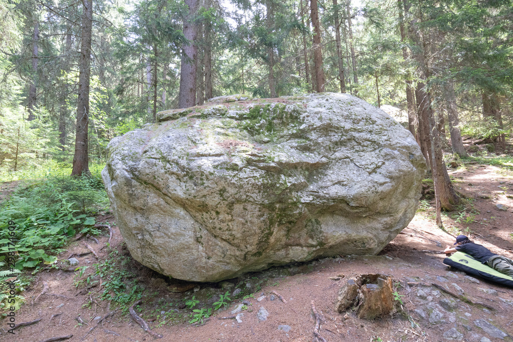 Bouldering in French Alps in Chamonix at a rock climbing park