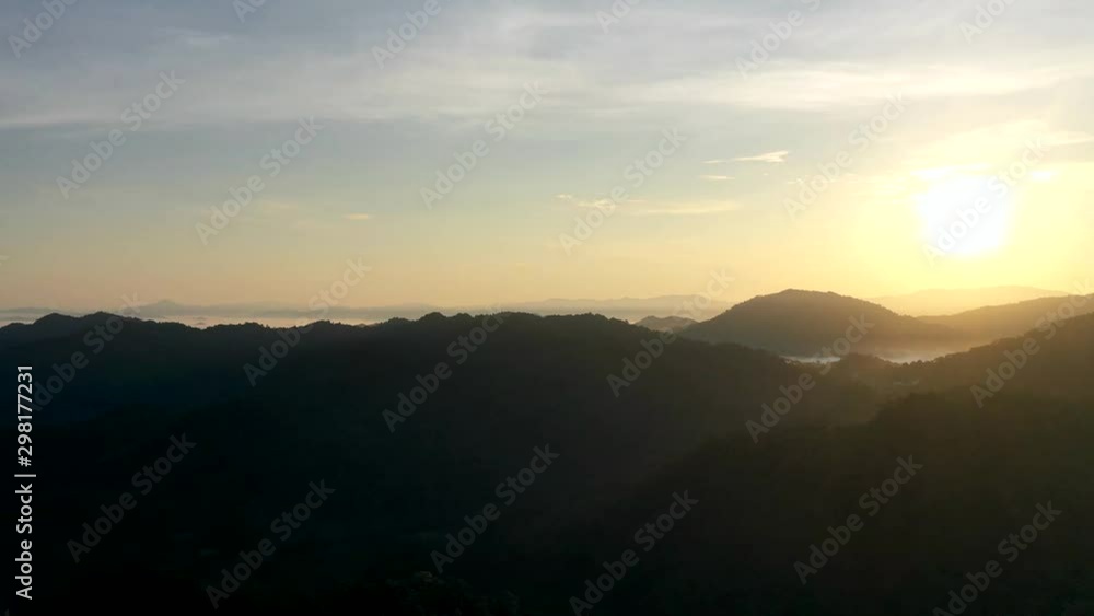 Aerial time lapse video of sunrise over mountains Aerial time lapse video of sunrise over mountains