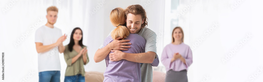 Fototapeta premium People hugging at group therapy session