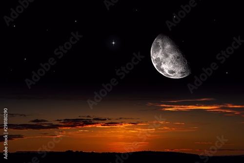 Obraz na płótnie Moon against the background of a bright cloud . Half moon . Crescent moon with beautiful sunset background . Generous Ramadan . Light from sky . Religion background . NASA w salonie