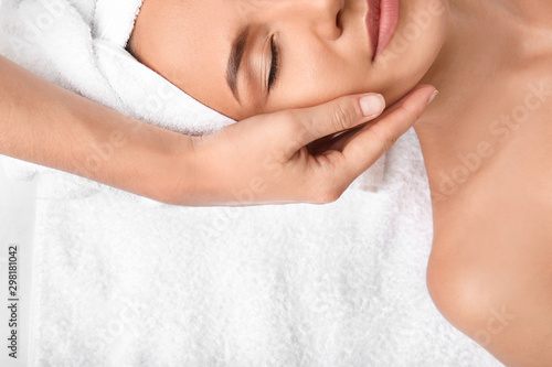 Young woman having massage ...