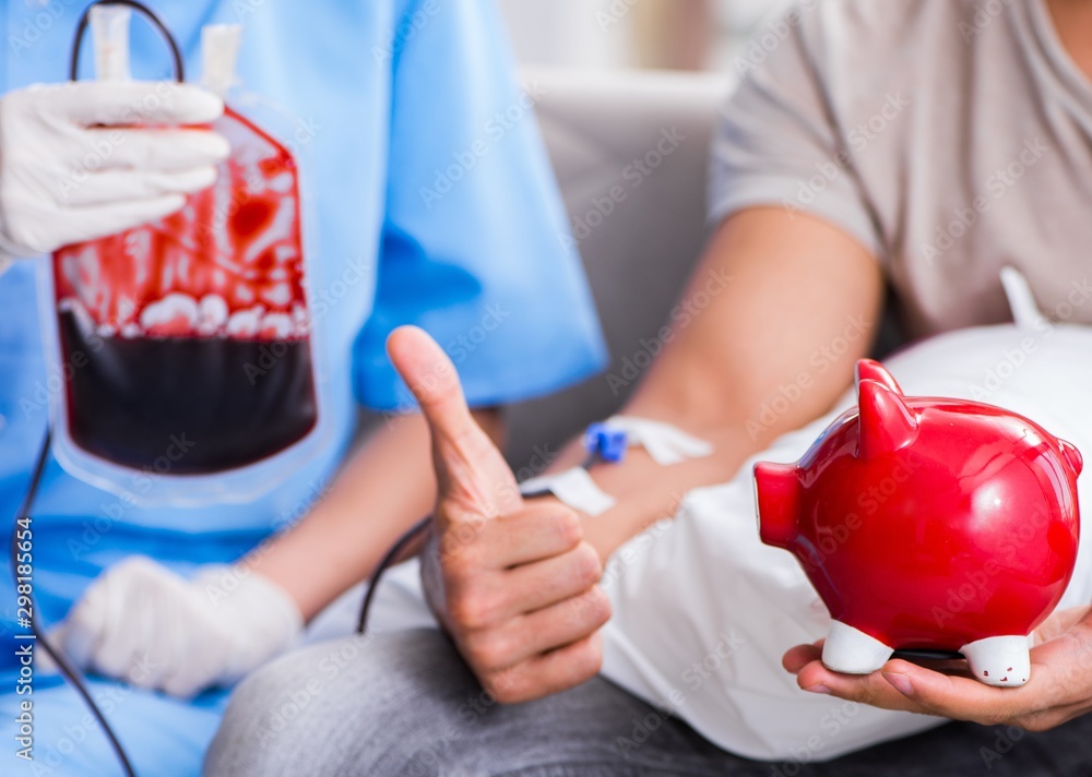 © Elnur - The patient getting blood transfusion in hospital clinic © Elnur - The patient getting blood transfusion in hospital clinic