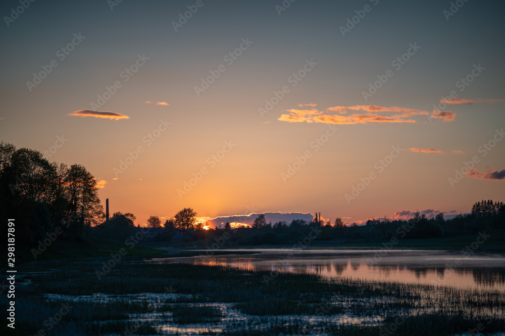 Spring sunset and river in Latvia