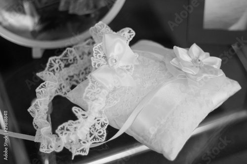 Wedding arrangement. Pillow for rings and garter of the bride. copy space, top view, flat lay © Вероника Одинокова