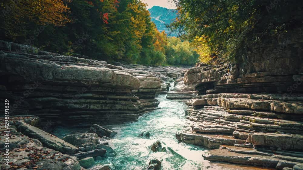 4K UHD Cinemagraph / seamless video loop of the mountain river Taugl in Austria, close to Mozart birthplace Salzburg. The water is rushing through naturally formed rocks.