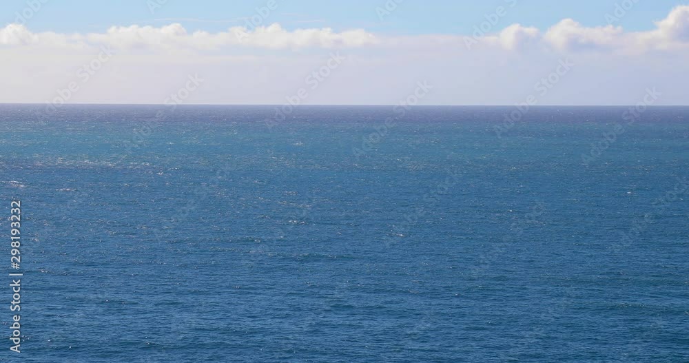 Blue water of sea, ocean waves and sky horizon view. Summer travel landscape background. Blue water of sea, ocean waves and sky horizon view. Summer travel landscape background.