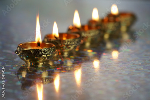 Metal Diyas lit up for the Indian Hindu festival of Diwal photo