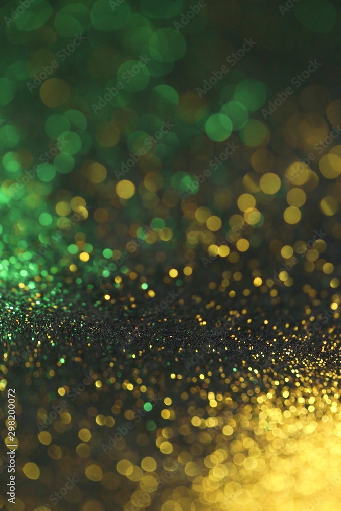 Wallpaper phone shining glitter.New Year and Christmas Festive background. Gold and green