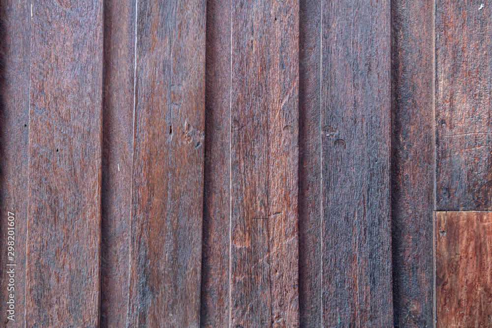 Wooden wallpaper background and texture copy space.Dark brown and black color wall background. Wooden wallpaper background and texture copy space.Dark brown and black color wall background.