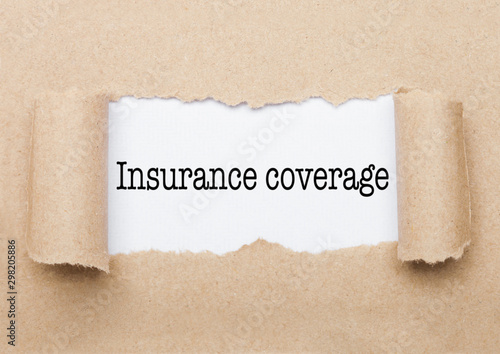 Photography Insurance coverage text appearing behind paper