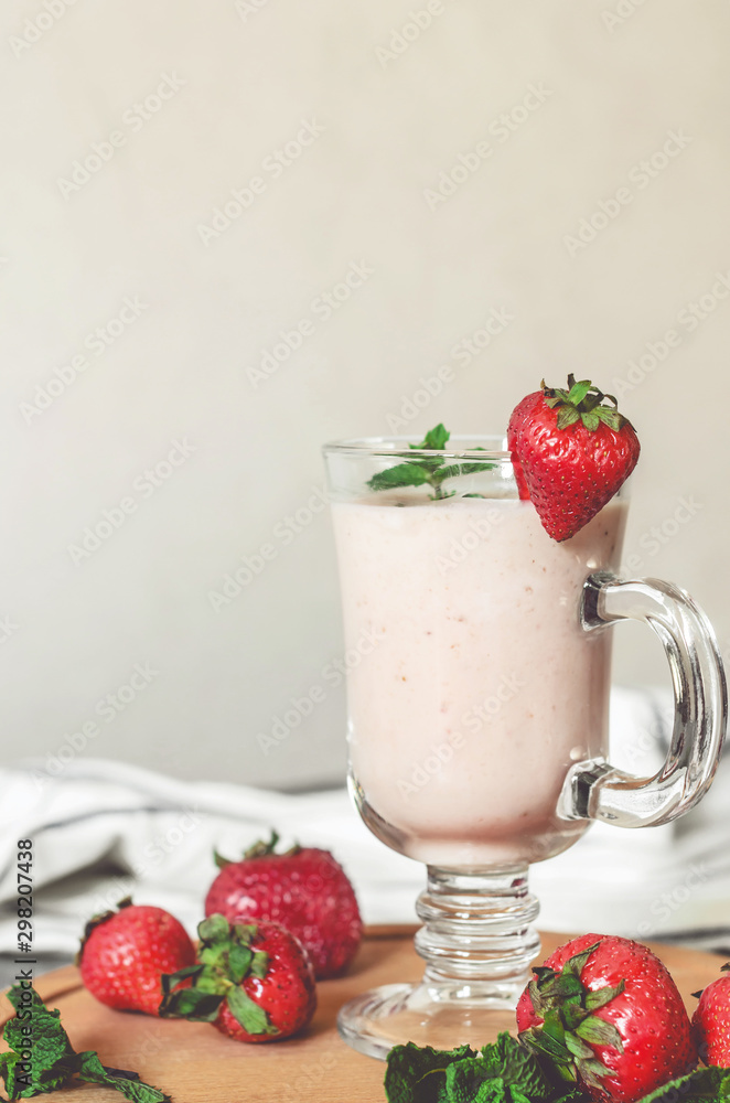 strawberry smoothie with mint on the table, front view strawberry smoothie with mint on the table, front view
