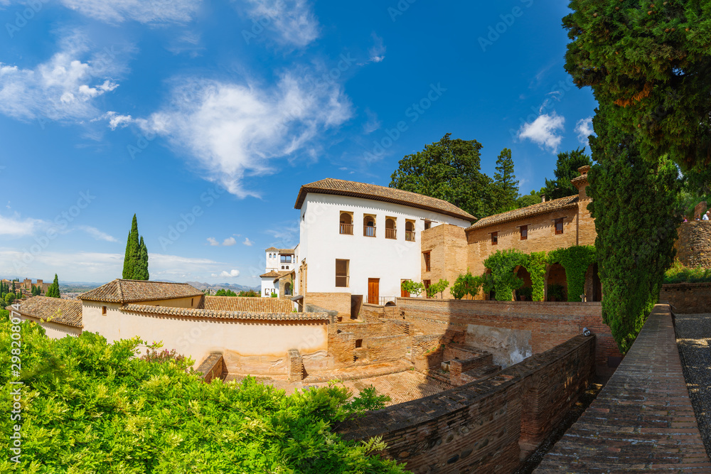 Alhambra. Panoramic view on the Generalife garden and Alkazaba. UNESCO heritage site. Granada, Andalusia, Spain